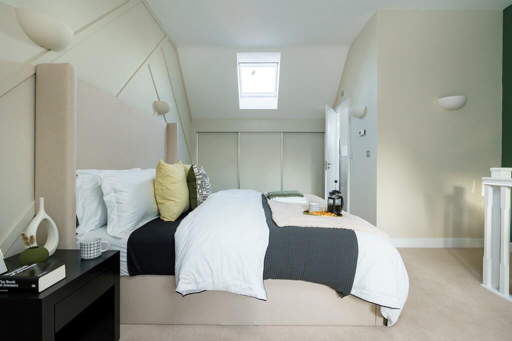 Spacious main bedroom with luxurious en-suite shower room