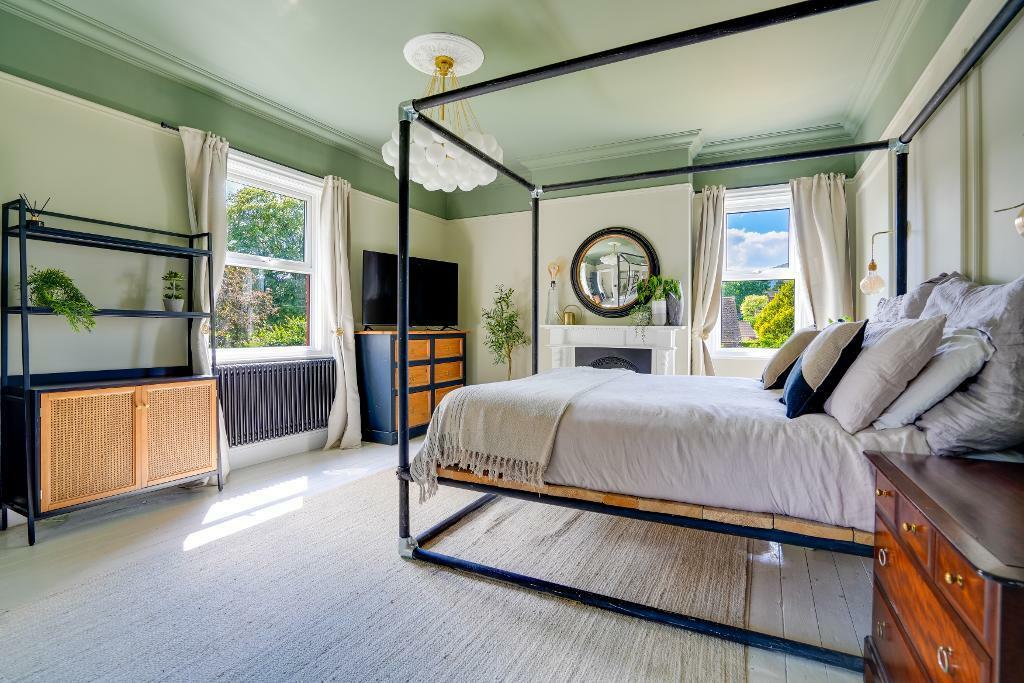 Lovely Bedroom 1 with feature fireplace
