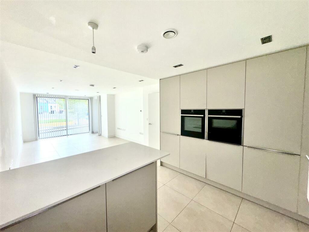 KITCHEN/DINING/LIVING ROOM