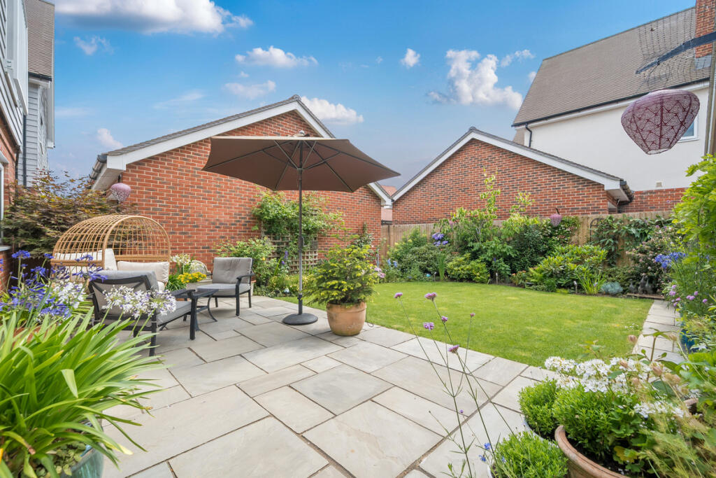 South facing private rear garden with newly laid Indian Sandstone terrace