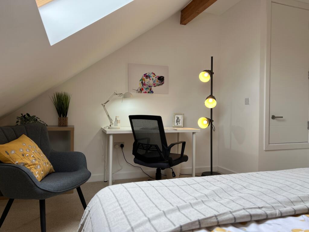 A spacious and inviting large double bedroom wi...
