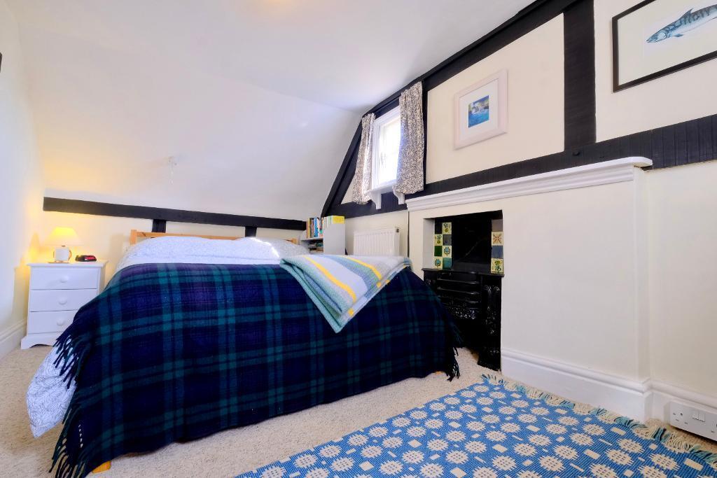 Bedroom 2 with original fireplace