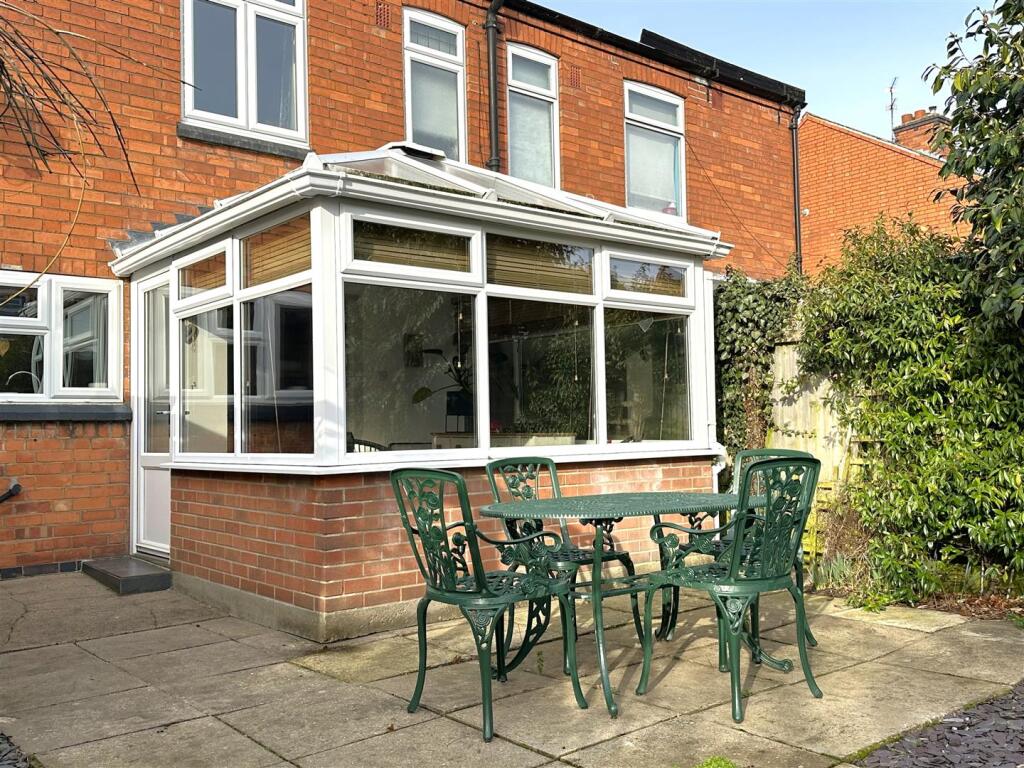 Conservatory &amp; Paved Seating Area 990