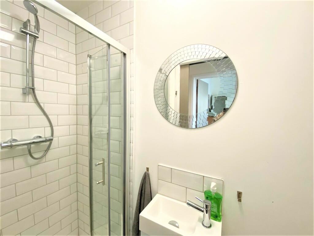 A modern and clean bathroom featuring a stylish...