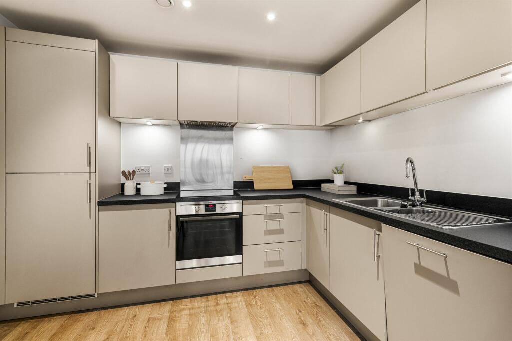 Explore this sophisticated kitchen designed with modern elegance and functionality.