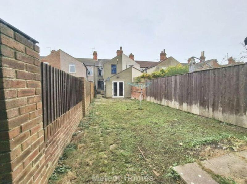 Rear garden and elevation