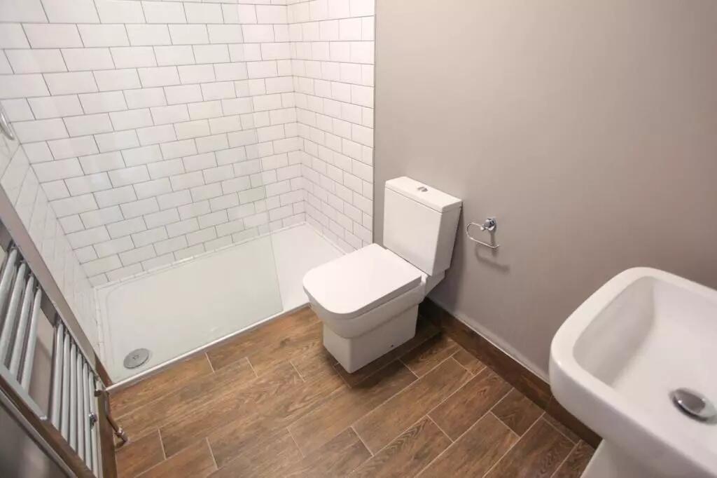 A modern and well-maintained bathroom featuring...