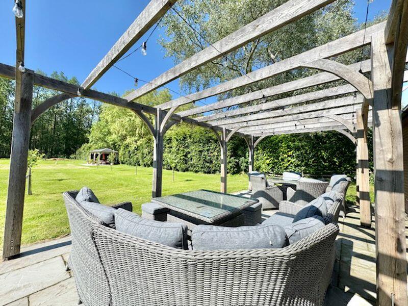 Pool house outside dining area view 3