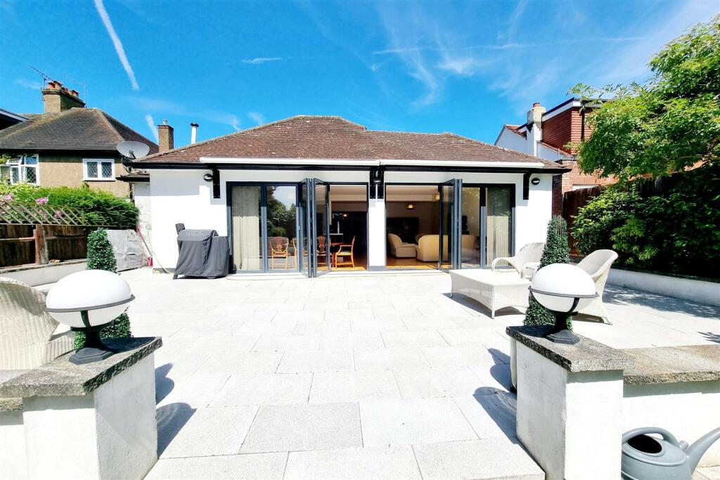 LARGE PAVED PATIO AREA: