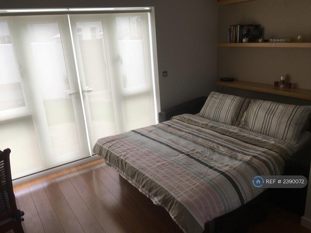 Sofa...Converts Super Quick To King-Size Guest Bed