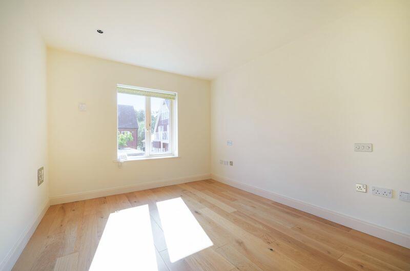 Second bedroom with fitted wardrobes