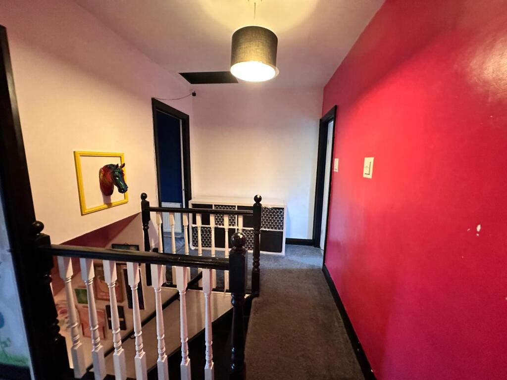 TO THE FIRST FLOOR LANDING