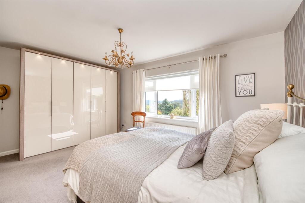 Bedroom One towards wardrobes and window.jpg