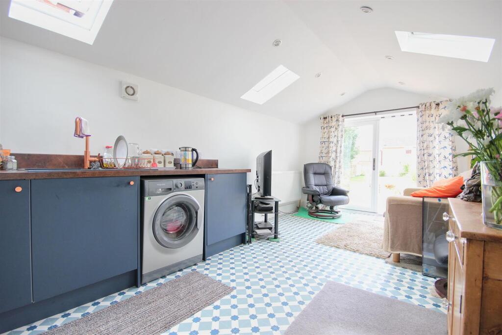 COMBINED DAY ROOM AND KITCHEN