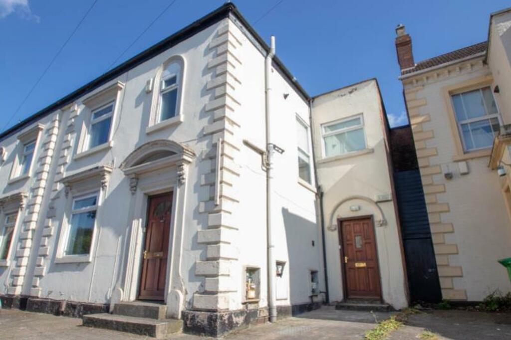A bright and inviting exterior view of the prop...