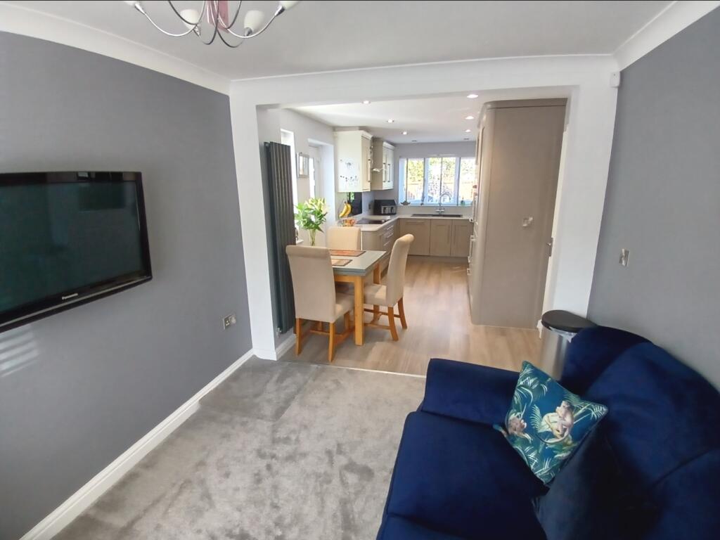 FAMILY ROOM THROUGH TO DINING KITCHEN
