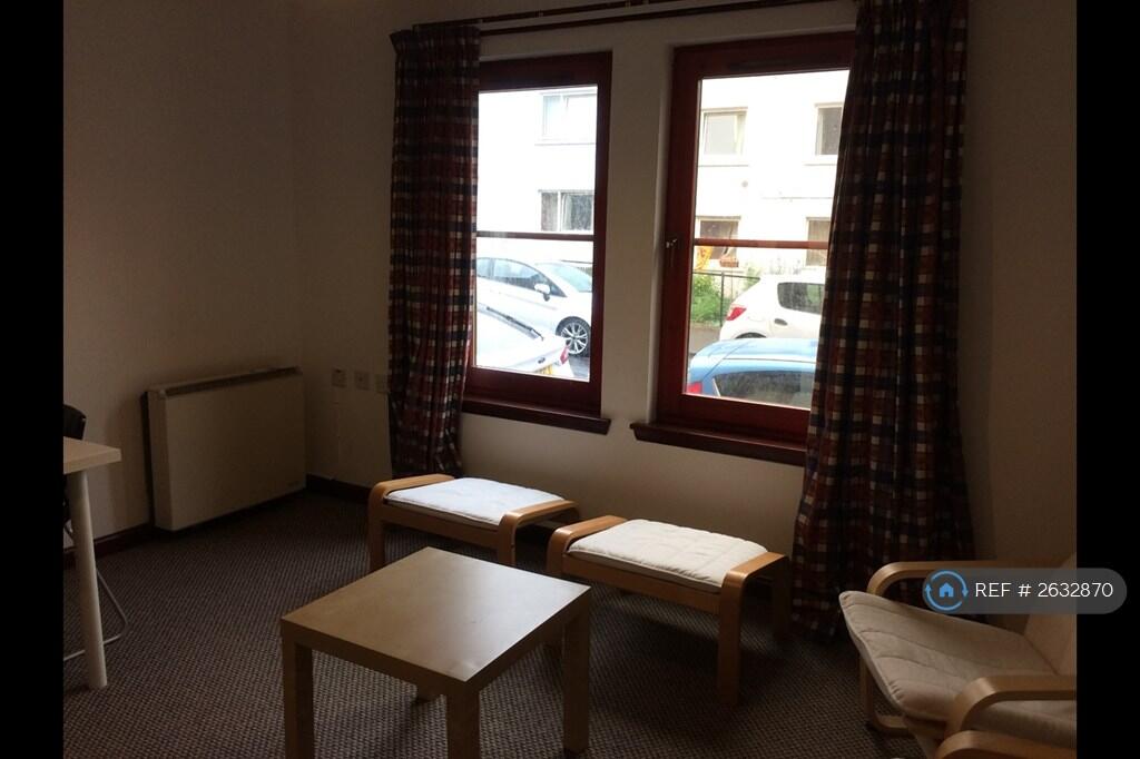 Bright And Spacious Living Room With Dining Table