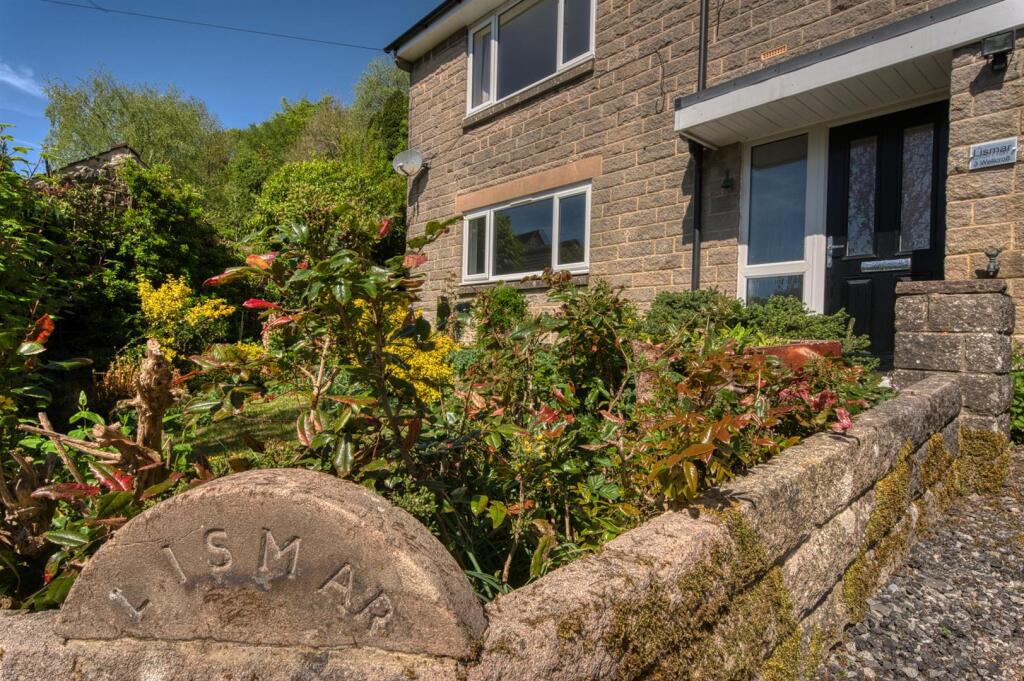 Front garden and house sign.jpg