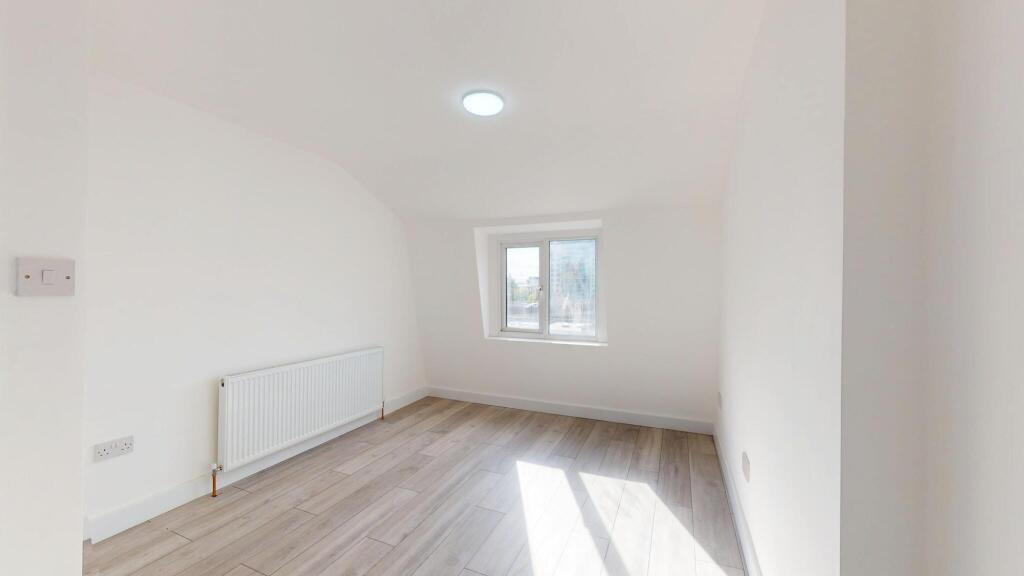 Bright, modern bedroom with ample natural light...