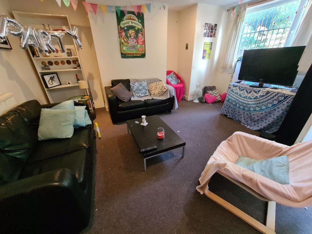 Cozy and inviting living room with comfortable ...