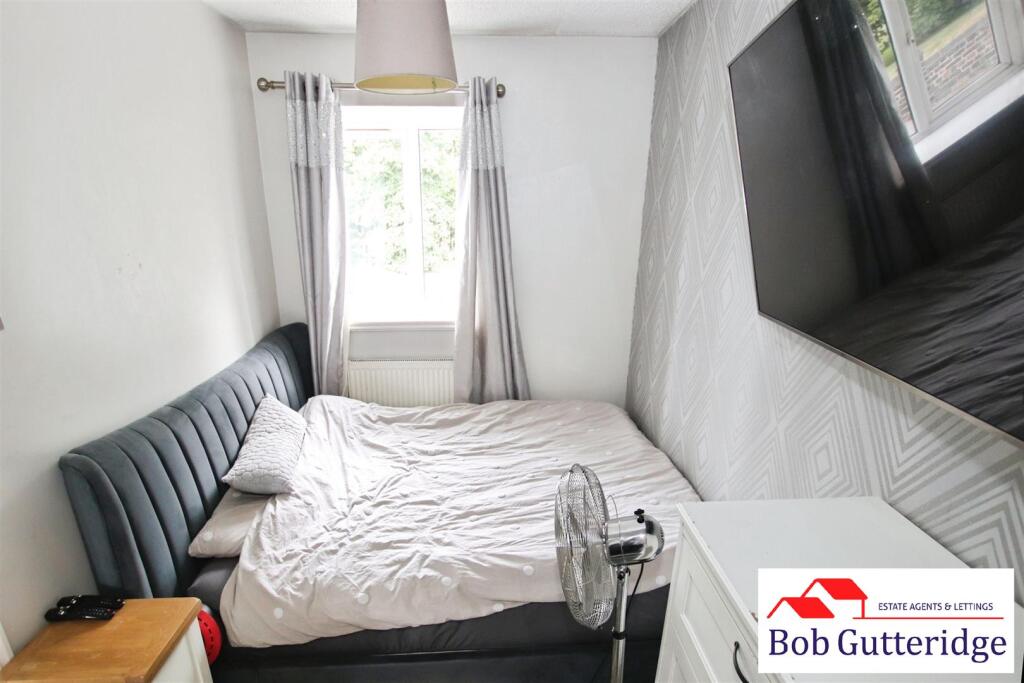 BEDROOM ONE (FRONT)