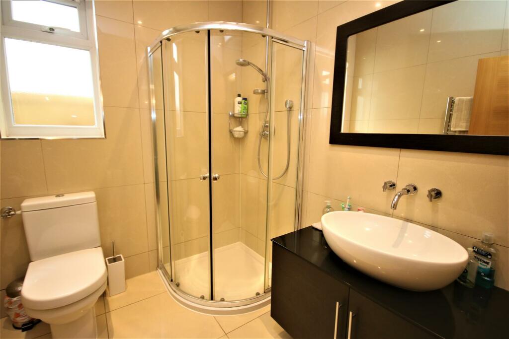 DOWNSTAIRS SHOWER ROOM/CLOAKROOM: