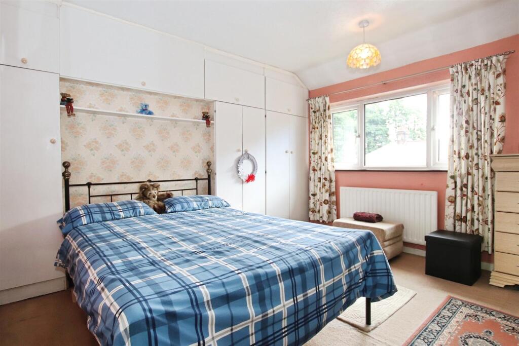 BEDROOM ONE (FRONT)
