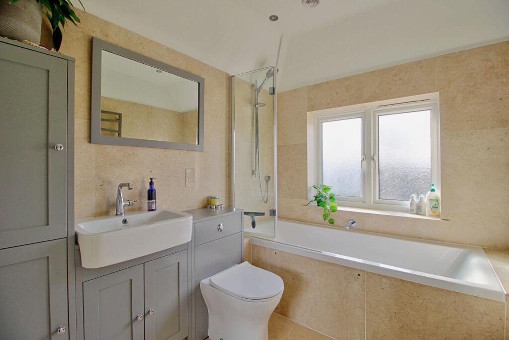 With limestone floor and de-misting mirror
