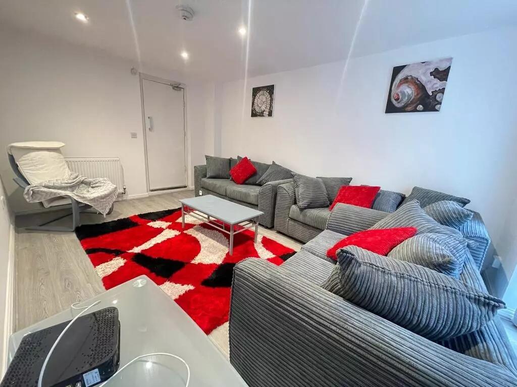 A contemporary living room featuring comfortabl...