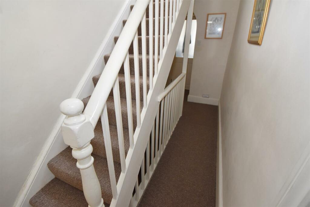 Hallway and stairs to basement and 1st floor.jpg