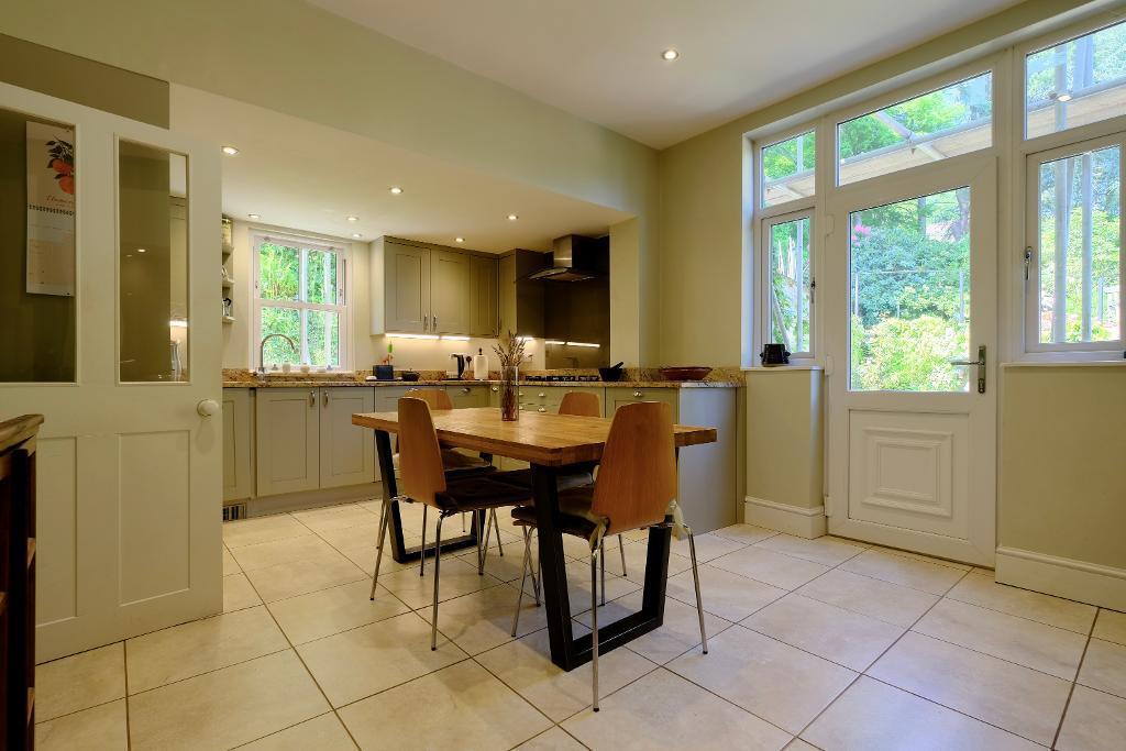 Modern kitchen and door to gardens