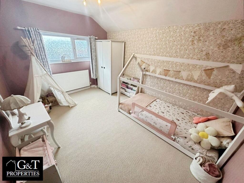 SECOND BEDROOM