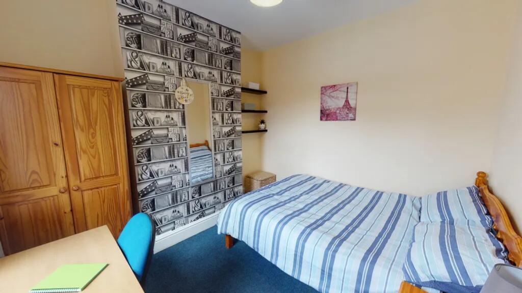 A cozy and well-decorated double bedroom perfec...