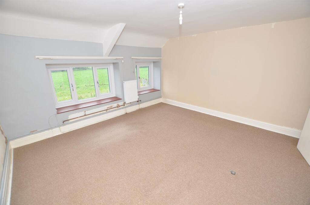 Mezzanine Level Front Bedroom 1