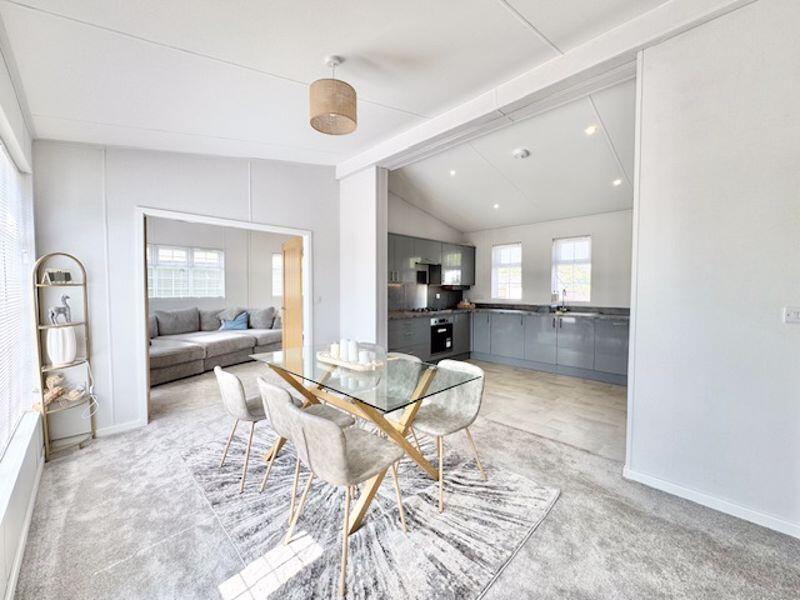 Dining to kitchen and lounge