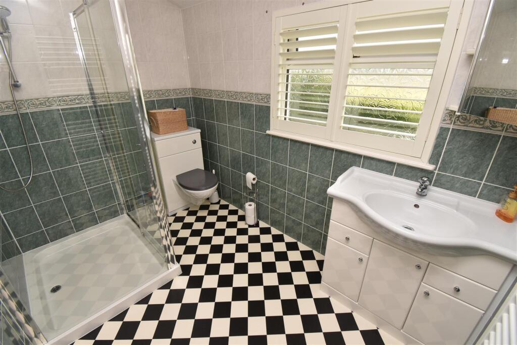 BEDROOM ONE EN-SUITE SHOWER ROOM