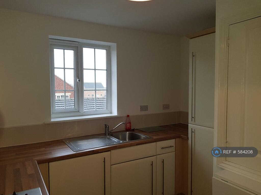 Kitchen With Integrated Washer And Fridge Freezer
