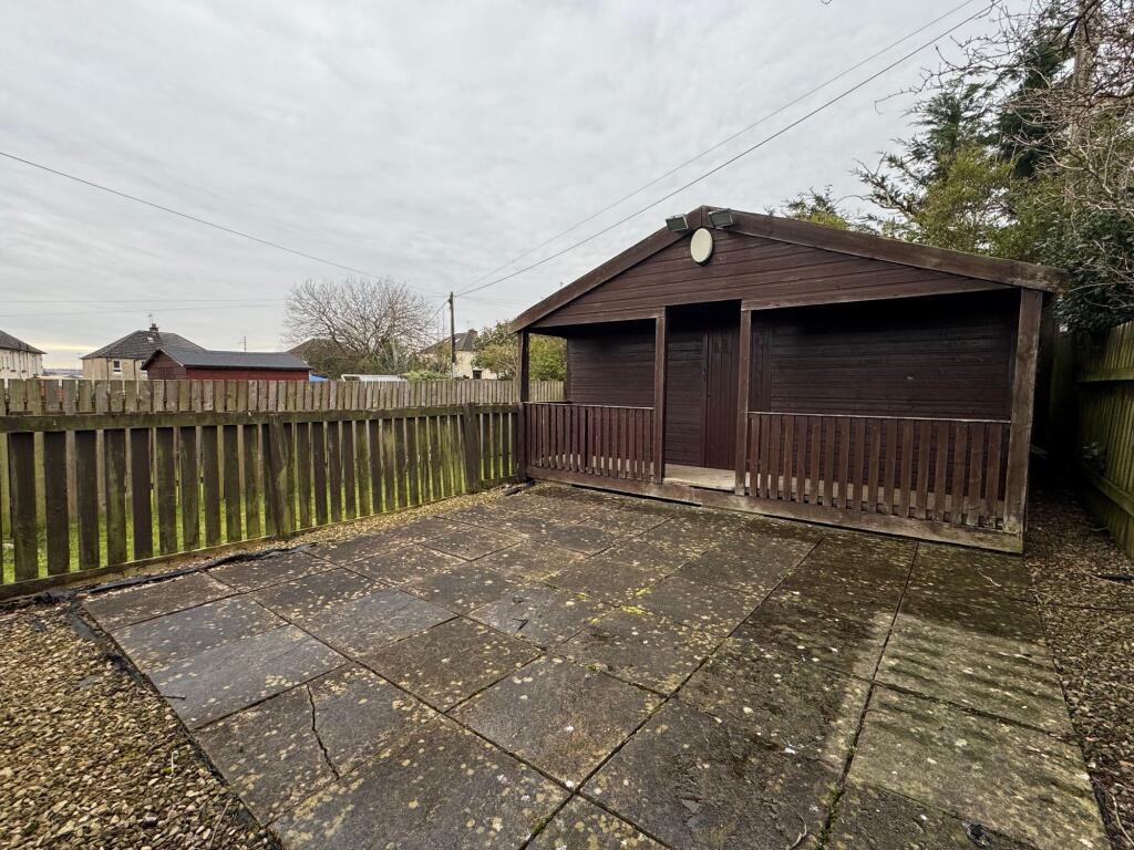Private patio and storage shed