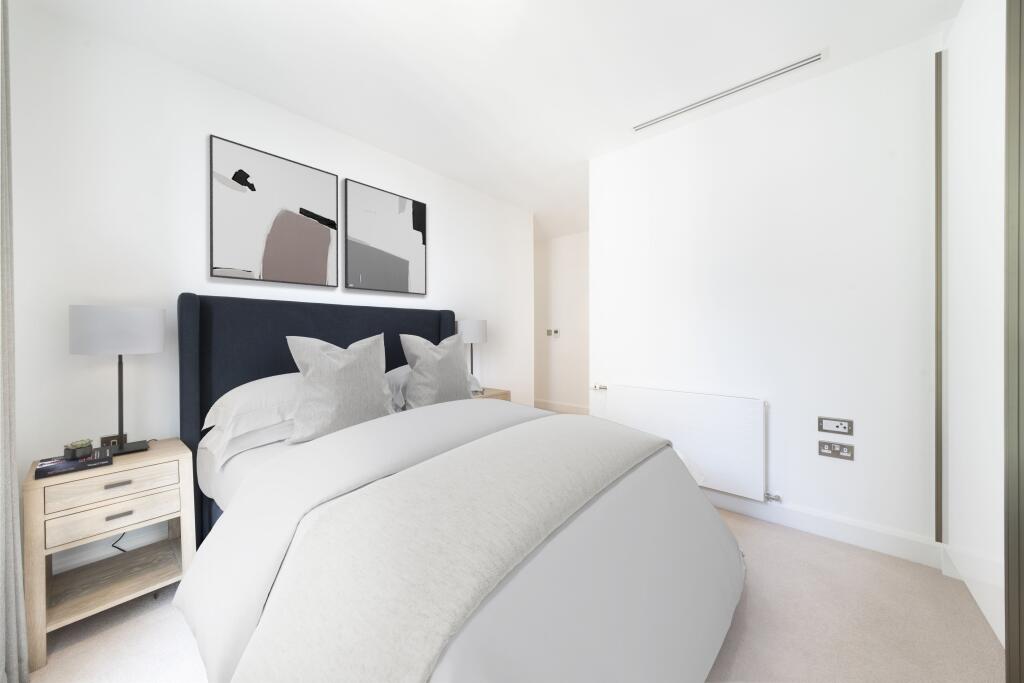 Experience comfort and elegance in this beautifully designed bedroom.