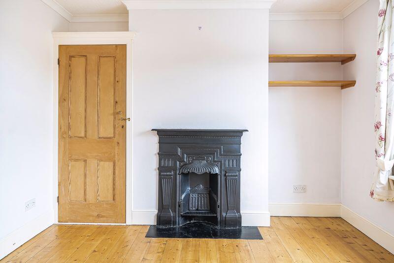 Bedroom one fireplace