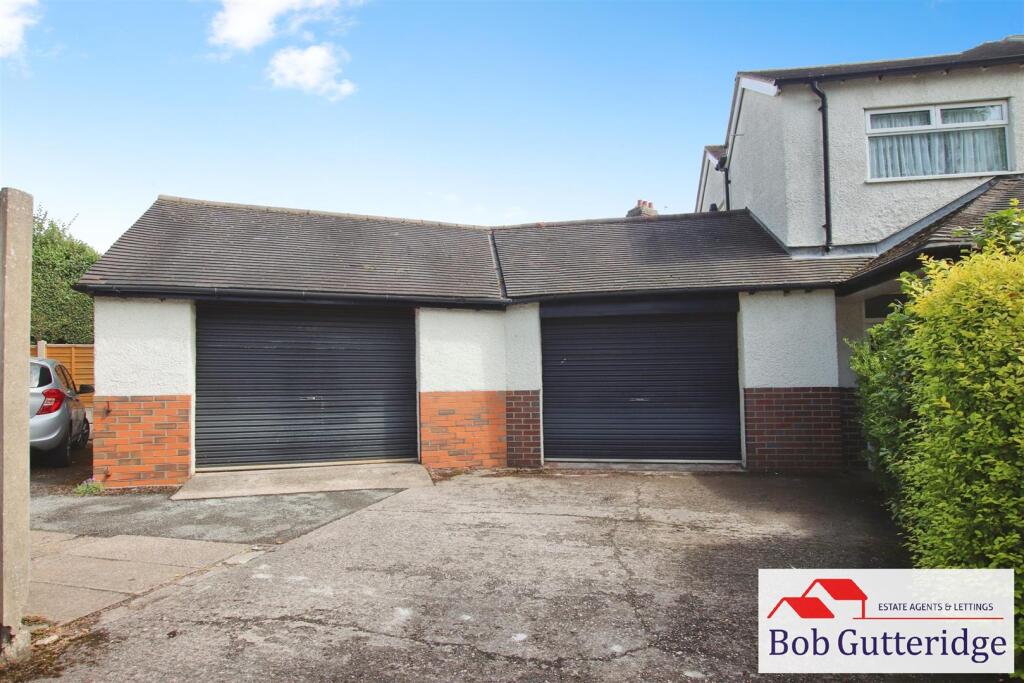 ATTACHED DOUBLE BRICK GARAGE