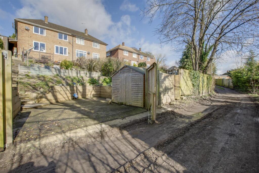 REAR OF HOUSE/PARKING