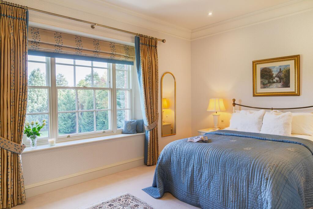 Bedroom 4 with garden views