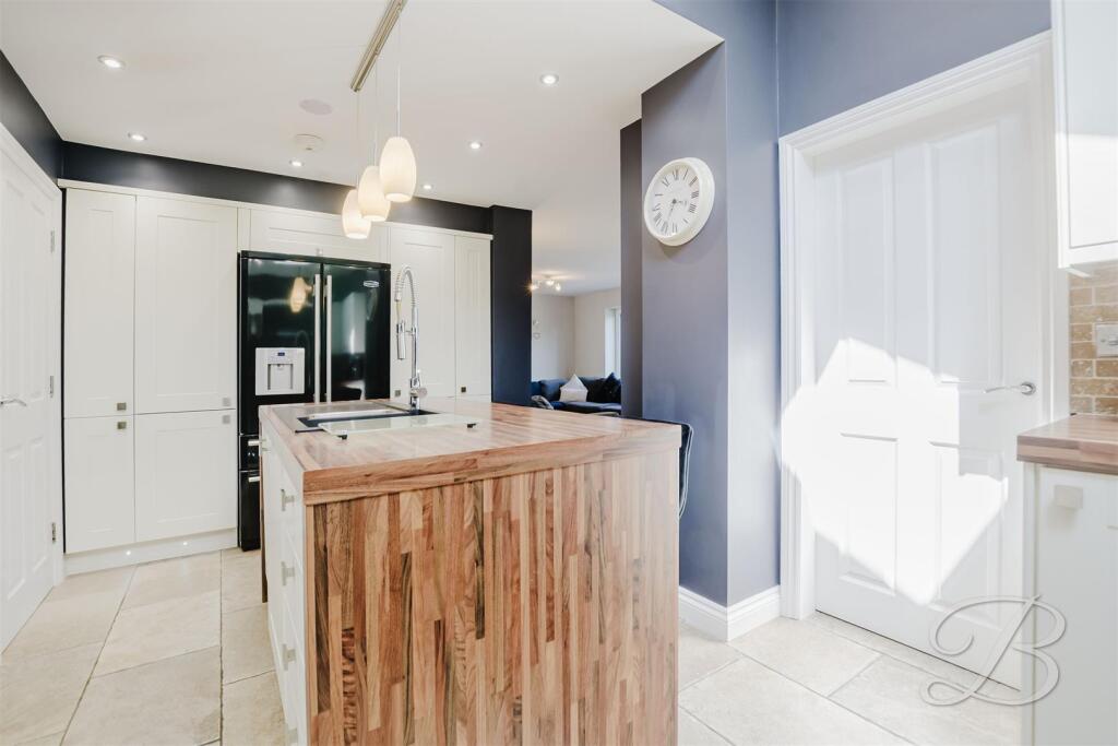 angles looking at the Fridge Freezer in the kitche