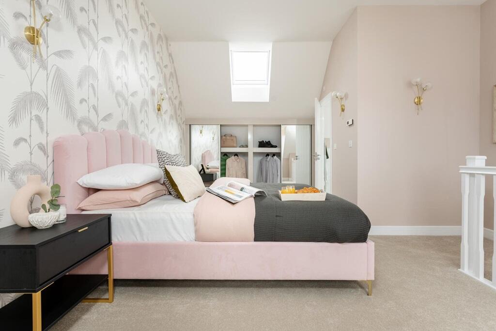 Bedroom one enjoys complete seclusion on the top floor