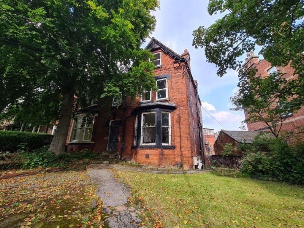 Charming red-brick semi-detached house surround...