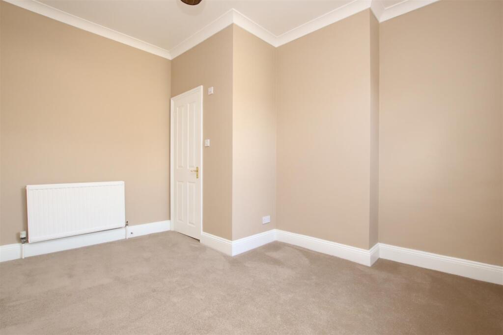 Bedroom three (2).JPG