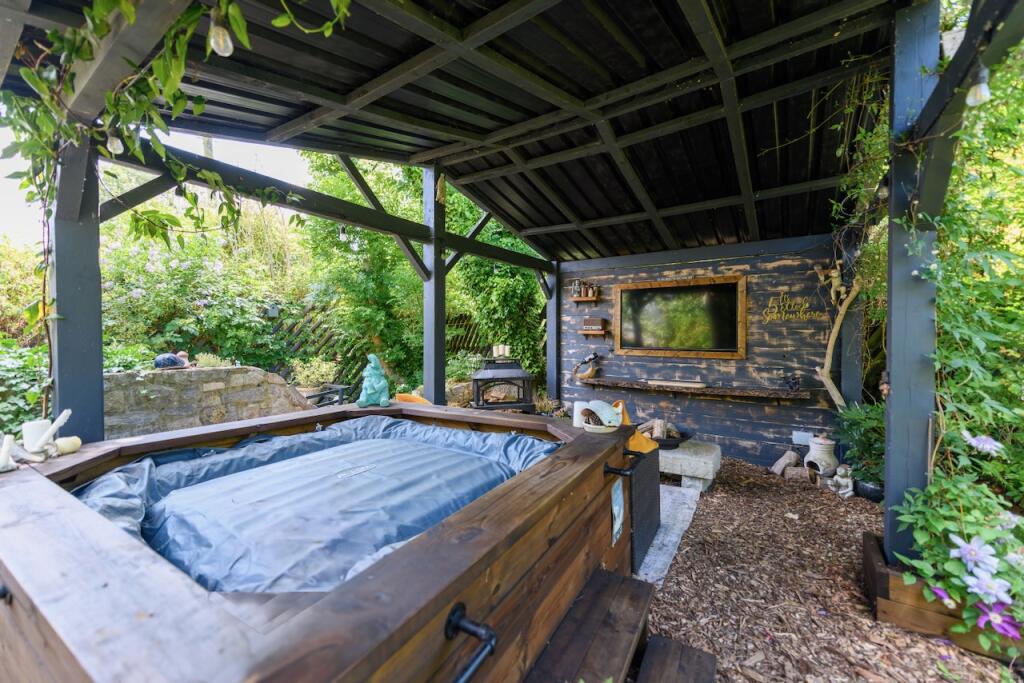 Hot tub and outdoor seating area