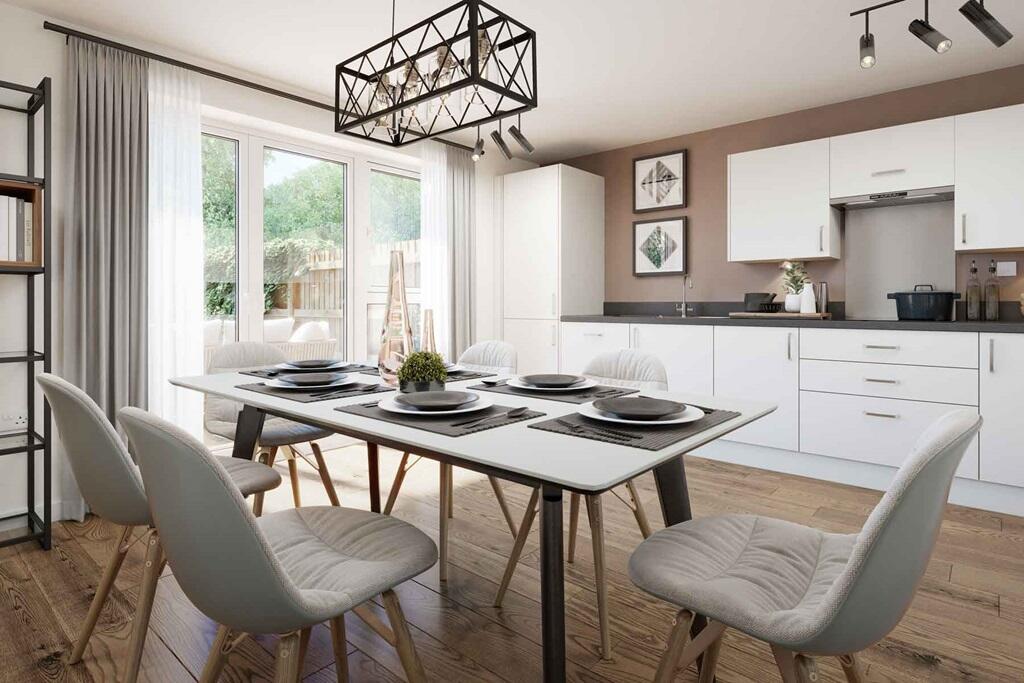 Sociable kitchen diner with double doors out to the garden