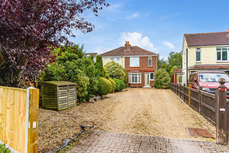 Front of Property with parking for mu...